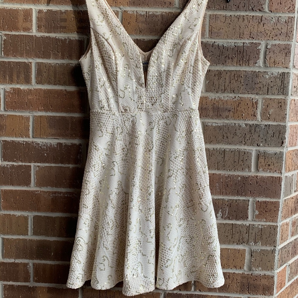 White dress with gold sequins!